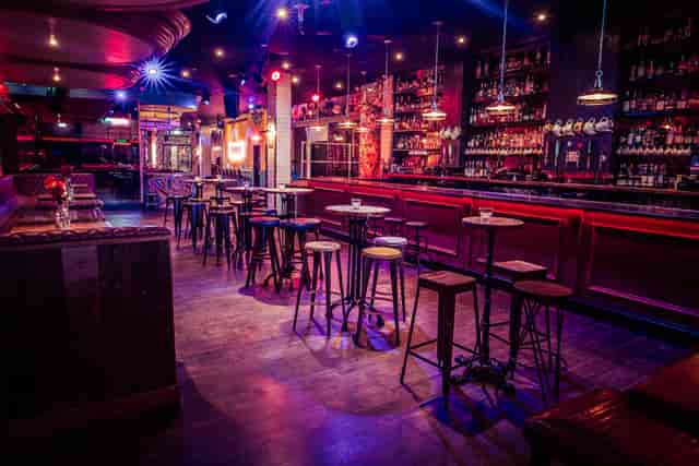 Stylish semi-private bar venue for intimate gatherings and networking events.