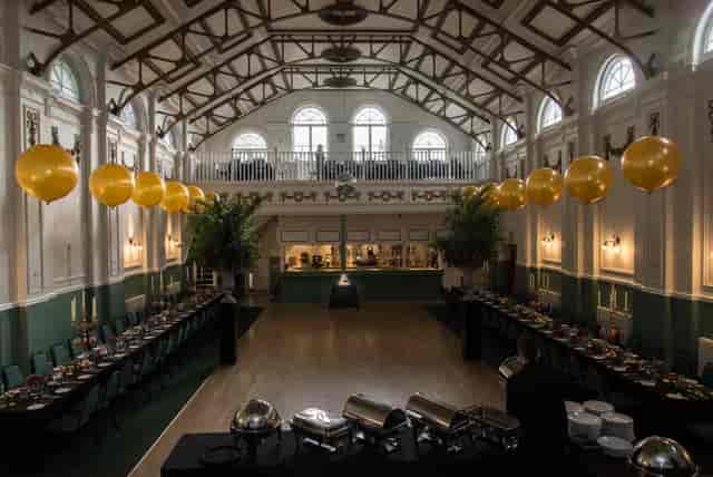 Main Hall at Hammersmith Club with high ceilings, ideal for events and dining.