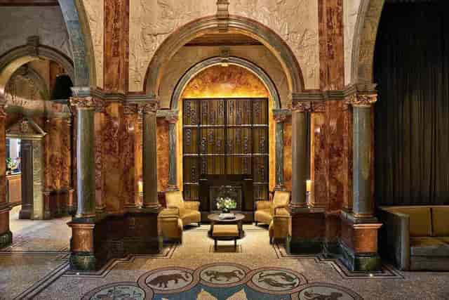 Sophisticated Kimpton Fitzroy London lobby with marble finishes, ideal for networking events.