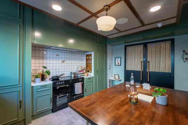 Kitchen table in Mortimer House, cozy decor for culinary events and gatherings.