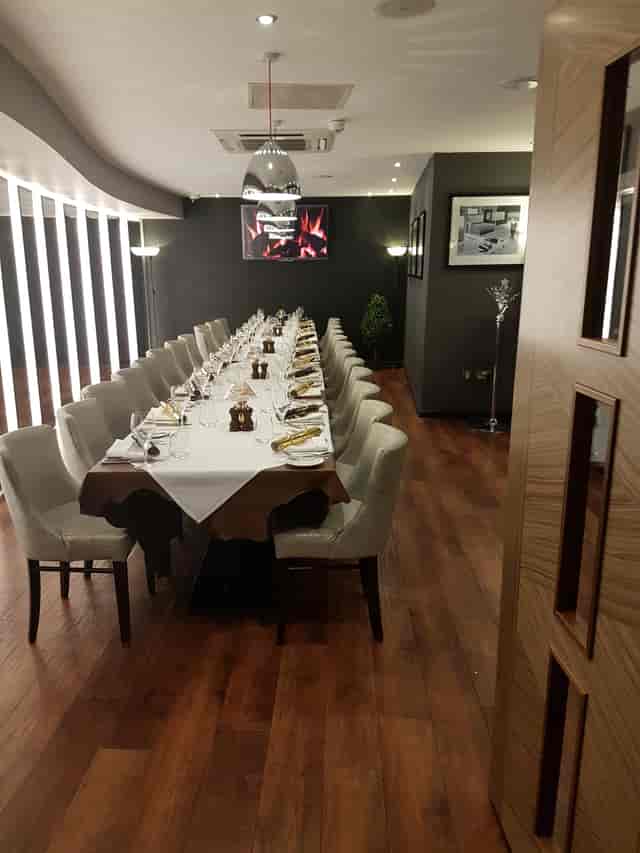 "Elegant dining setup in Marco Pierre White Private Dining Room for corporate events."