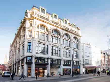 Historic event space with large windows, ideal for conferences and social gatherings.