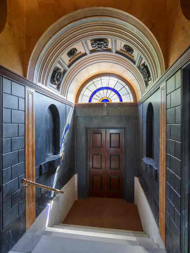 Elegant entrance of Soane Suite with stained glass, perfect for upscale events.