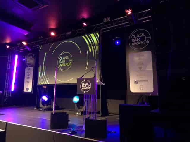 Concert Hall in EartH, stage with dynamic lighting for Class Bar Awards event.