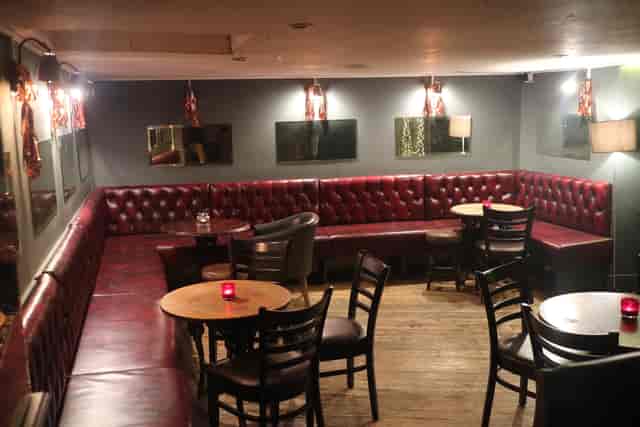 Cozy basement lounge at The Regent Pub, perfect for private events and gatherings.