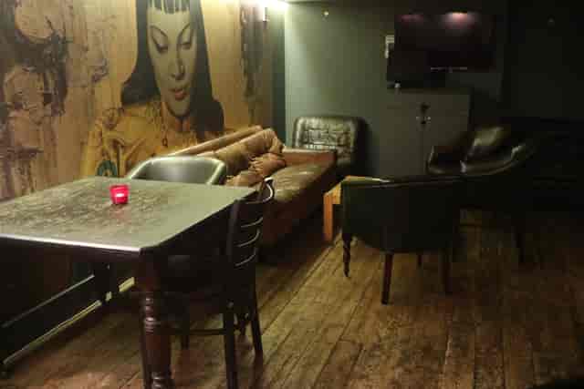 Cozy basement meeting space at The Regent Pub, ideal for gatherings and team-building events.