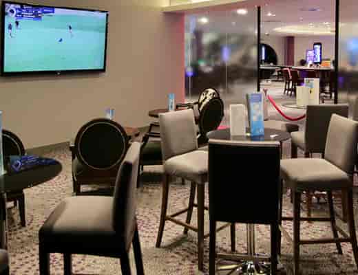 Stylish Sports Lounge at Alea Casino, ideal for networking events and relaxation.