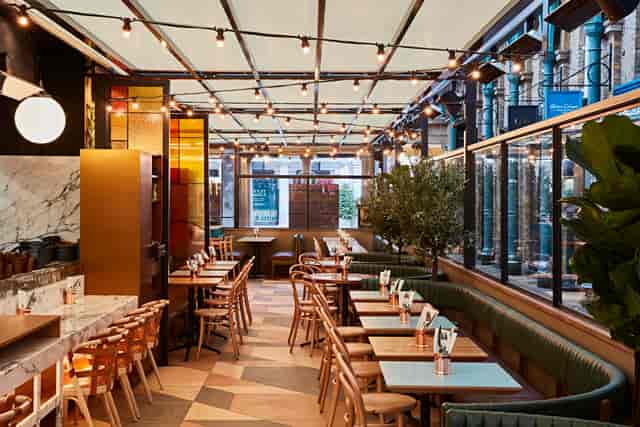 Stylish Main Restaurant at Buns&Buns, ideal for networking events with natural light.