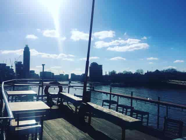 West-facing deck at Tamesis Dock, scenic venue for events with city skyline views.