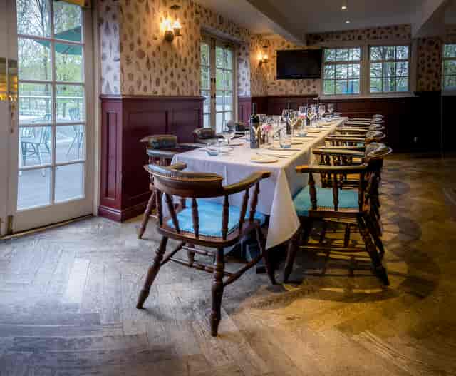 Elegant dining table at The Bridge, perfect for corporate meetings and intimate gatherings.