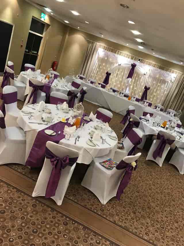William Duesbury at a sophisticated banquet with elegant purple accents, ideal for weddings.