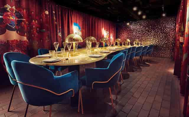 Elegant dining setup in The Rambutan Room, ideal for exclusive corporate dinners and events.