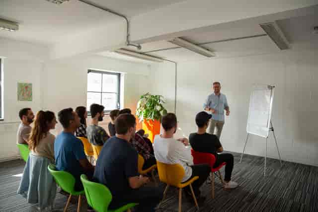 Dynamic meeting space in Union Court with flip chart for workshops and brainstorming.