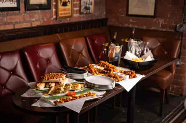 Appetizers and champagne at Quarter Hoop, Punch Tarmey's Liverpool for corporate events.