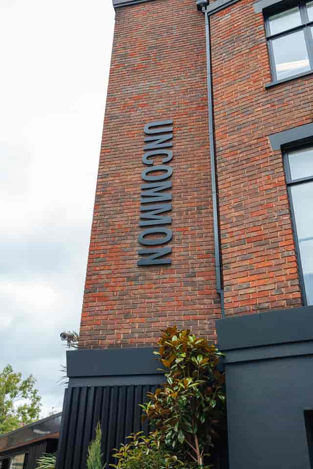 Zen Studio exterior in Uncommon Fulham: modern brick venue for creative events and workshops.