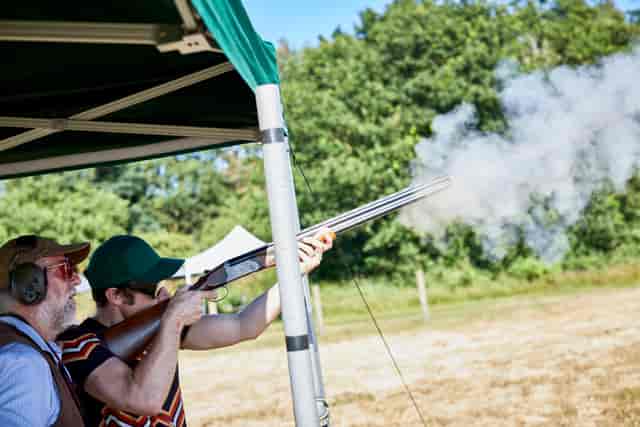 Outdoor team-building clay shooting at Lifehouse Spa and Hotel, fostering camaraderie.