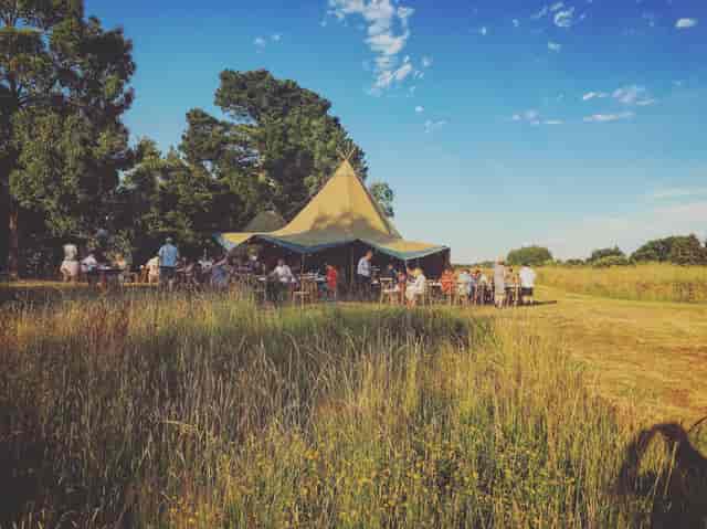 Vibrant outdoor event under a tent at Lifehouse Spa, perfect for summer celebrations.