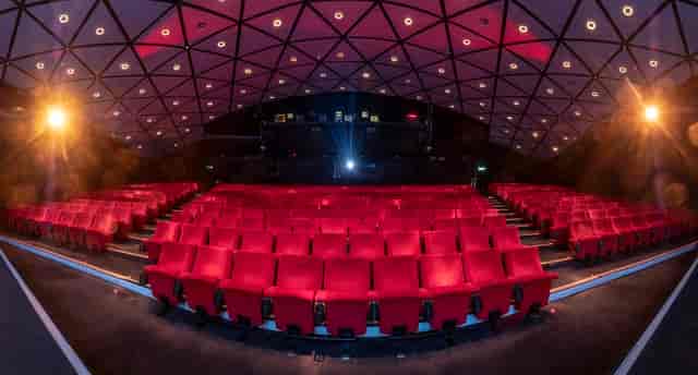 Modern auditorium with red seating, ideal for presentations and events at BFI Southbank.
