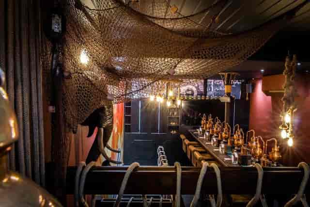 Nautical-themed dining space at Beach Rum Distillery for intimate events.