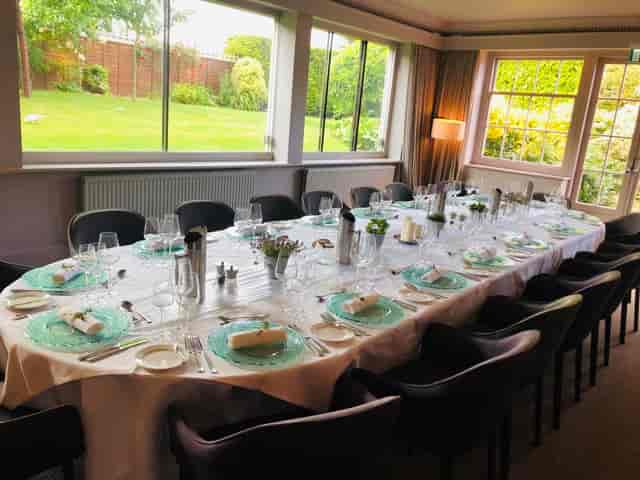 Elegant dining table at The Elms Hotel for corporate events and special occasions.
