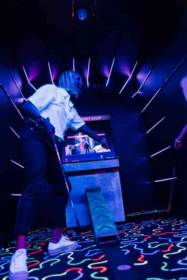 Vibrant event space with interactive gaming setup for corporate events and social gatherings.