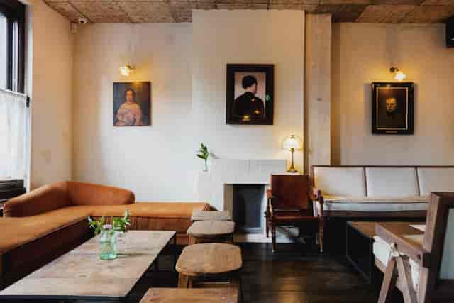 Cozy meeting space in Martello Hall with vintage decor, ideal for creative gatherings.