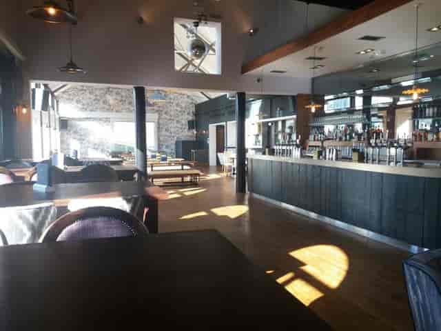 Spacious modern event venue with stylish bar and natural light in York.