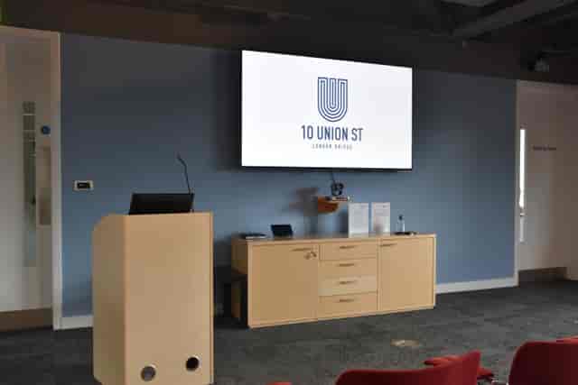 Modern meeting room with tech lectern for corporate events