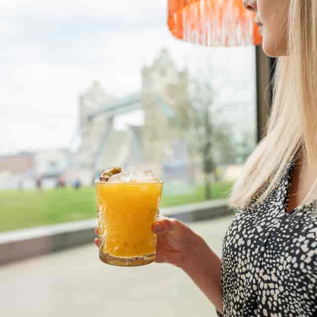 Vibrant cocktail at Temakinho Tower Bridge, ideal for networking events and social gatherings.