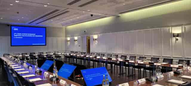 Lee Kuan Yew Room with U-shaped table setup for professional meetings and events.