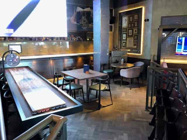 Versatile event space in Westwood with sleek bar for networking and social gatherings.
