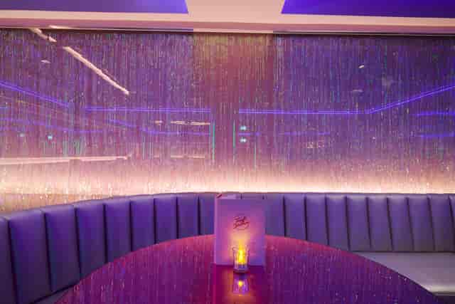 Modern event space at Tonight Josephine Waterloo with elegant backdrop for gatherings.