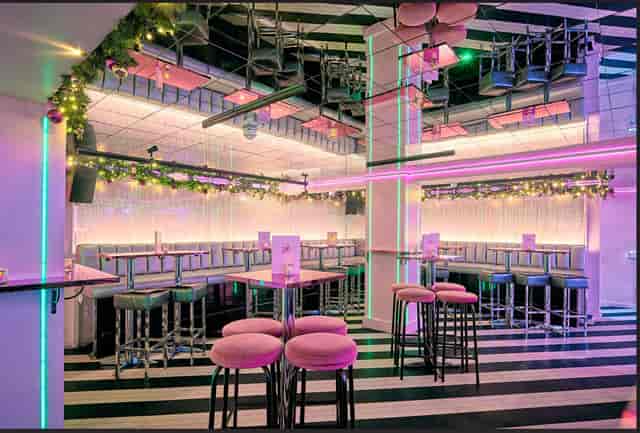 Neon-lit bar at Tonight Josephine Waterloo for cocktail receptions and networking events.