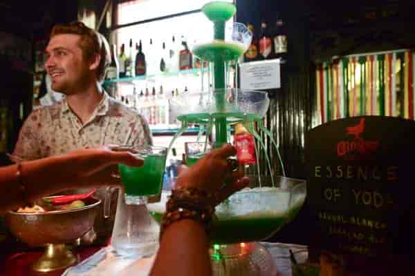 Vibrant bar setup with multi-tiered drink fountain for themed events at Hotel Pelirocco.