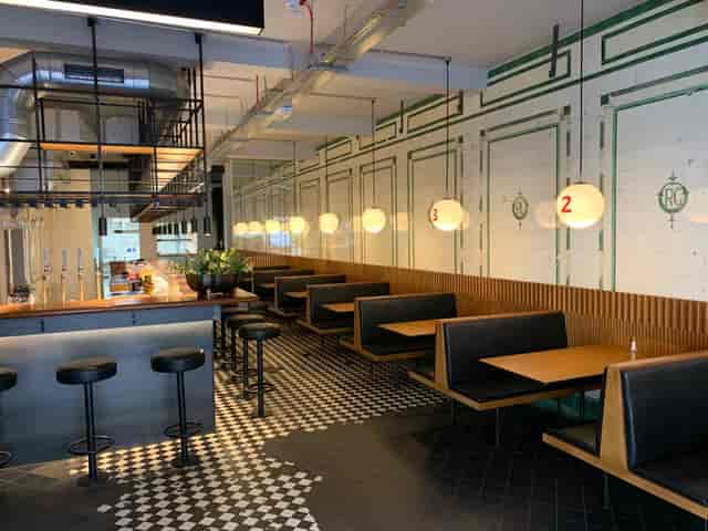 Modern venue in Hoxton with cozy seating, ideal for gatherings and meetings.