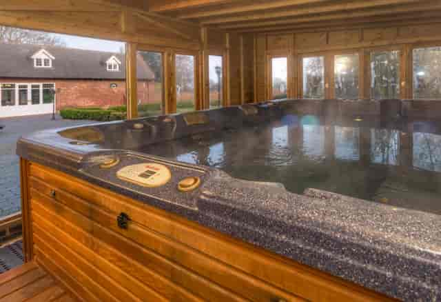 Luxurious hot tub in private estate, perfect for retreats and team-building events.