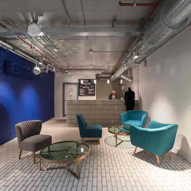 Modern reception area with stylish seating for events at Boom Cycle Battersea.