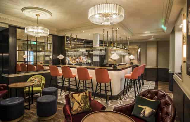 Stylish Sloane Place Bar with plush seating, ideal for networking events and cocktail receptions.