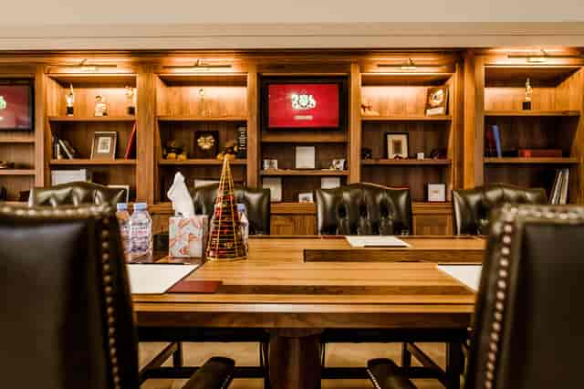 Elegant conference room in Oxford with wooden table, ideal for business meetings.