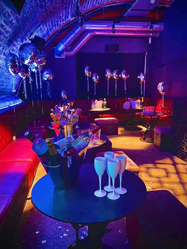 Vibrant event space with stylish seating for celebrations and parties.