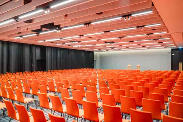 Lansdown Suite at Apex City of Bath Hotel with vibrant orange chairs for events.