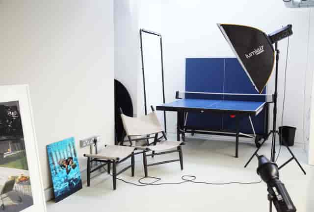 Versatile event space with ping pong table for team-building and brainstorming sessions.