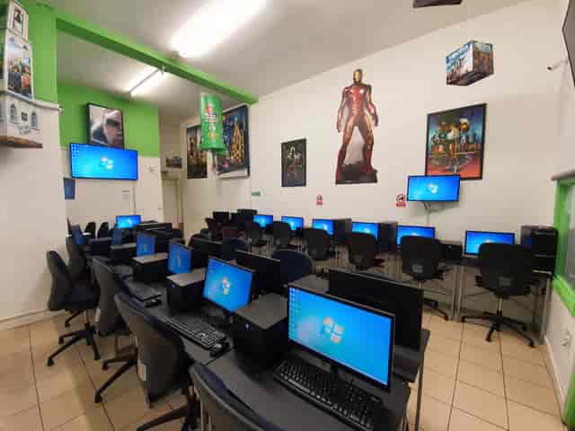 Tech-equipped training room with superhero decor for workshops and seminars.