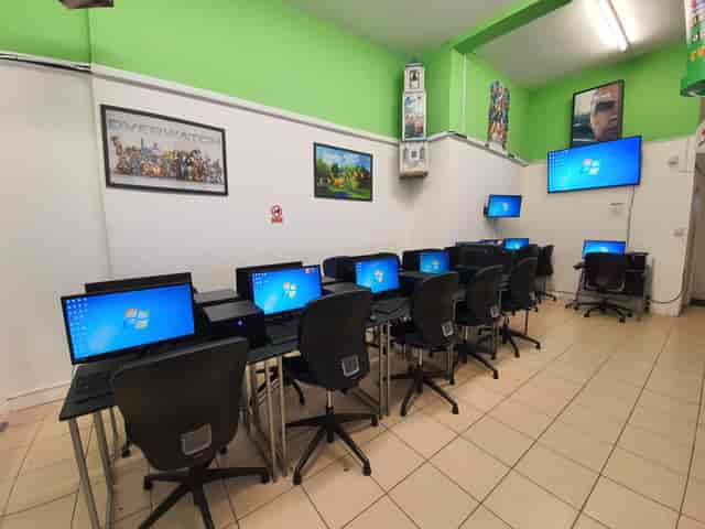 Tech-equipped meeting space with computers for workshops and training at Software Academy.