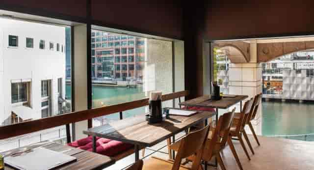 Upstairs Lounge at Vagabond, modern venue with water view for events and dining.