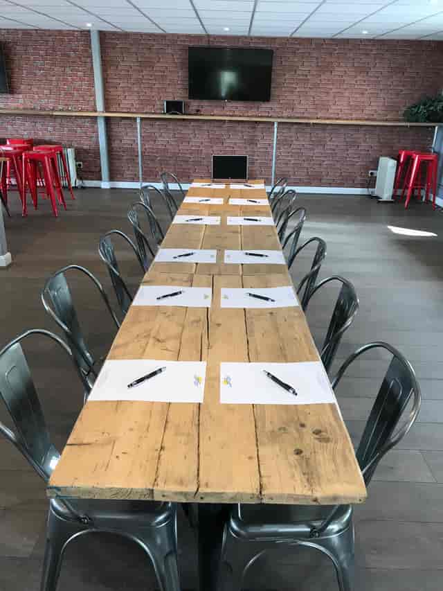 Whole Venue at Lagoona Bar & Grill with long table setup for meetings and events.