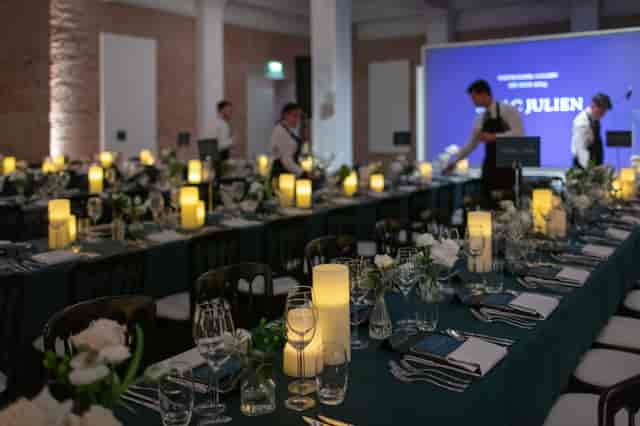 Emerald banquet table setup for corporate dinner and brand activation at GALLERY46.