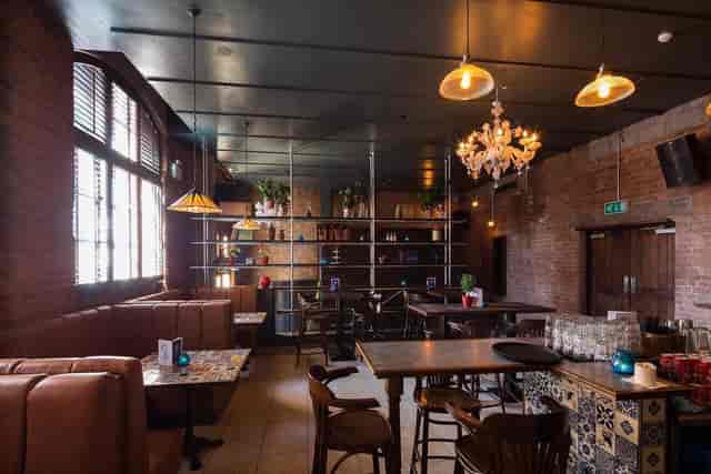 Stylish venue with warm lighting for intimate gatherings and networking events.