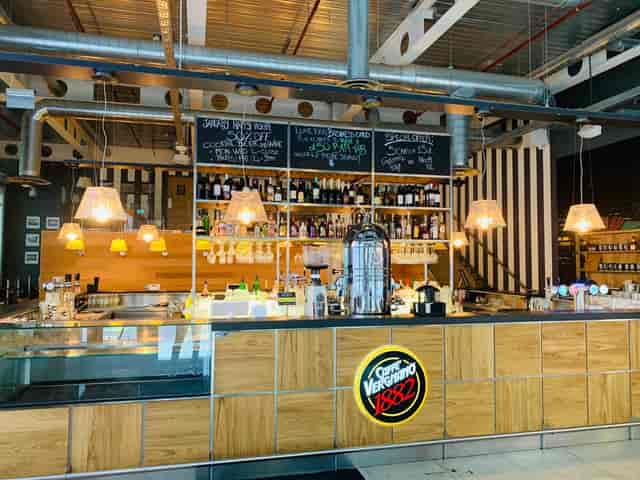 Modern bar setup at Whole Venue, 1882 Mark Lane, ideal for networking events and casual meetings.