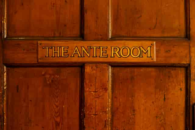 Ante Room at HAC: elegant wooden door for private meetings and exclusive events.